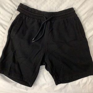 Black shorts with white lining on the sides